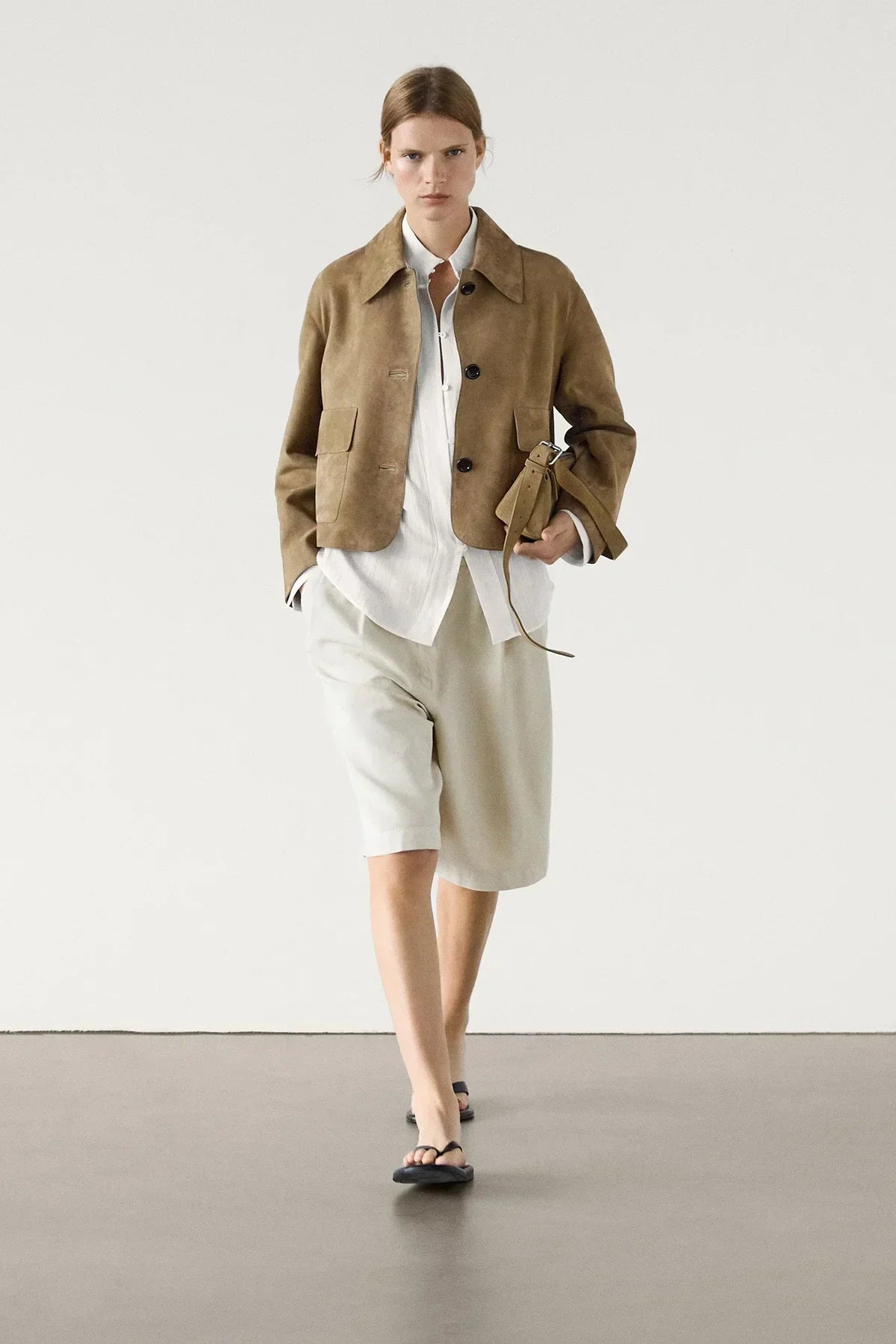 Chaqueta corta unisex elegante de temporada