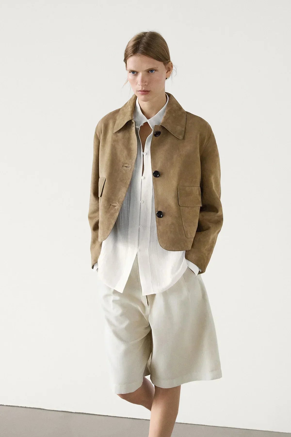 Chaqueta corta unisex elegante de temporada