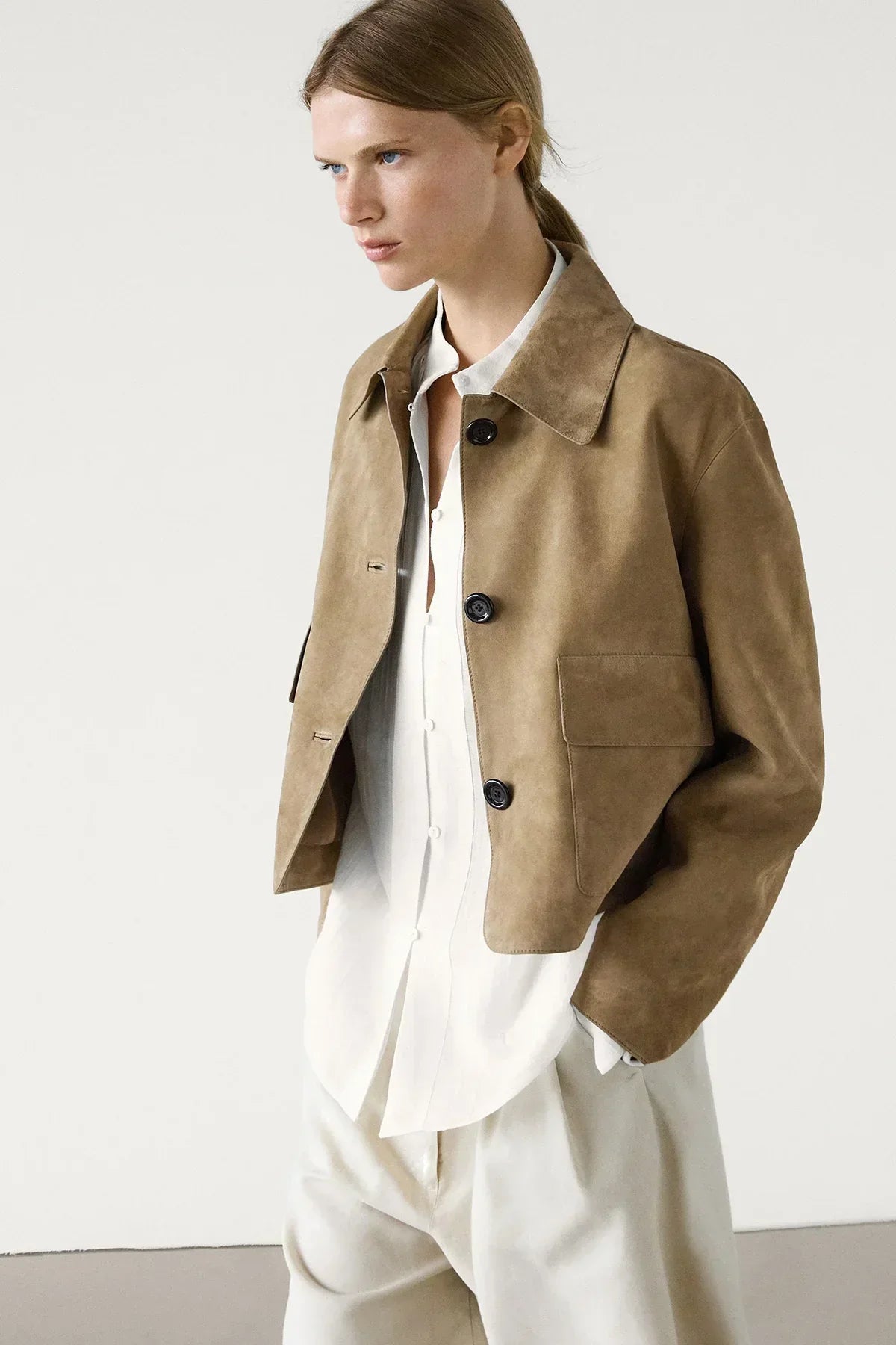 Chaqueta corta unisex elegante de temporada